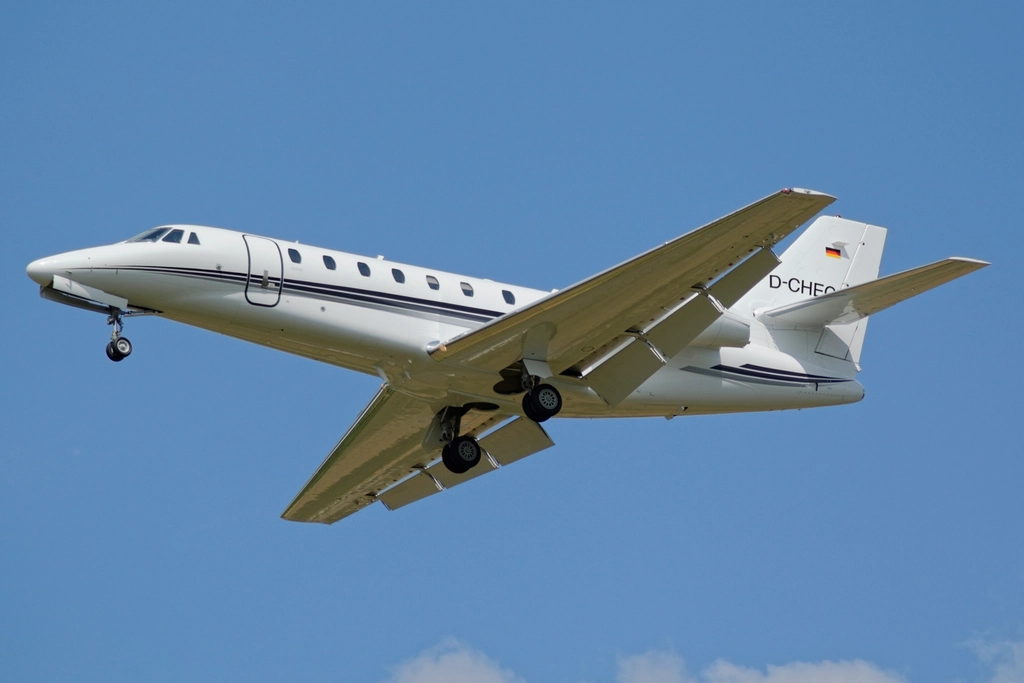Private jet flying high skyward