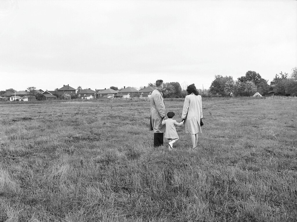 The Gibbs family looking at their half-acre lot near Churchill Avenue