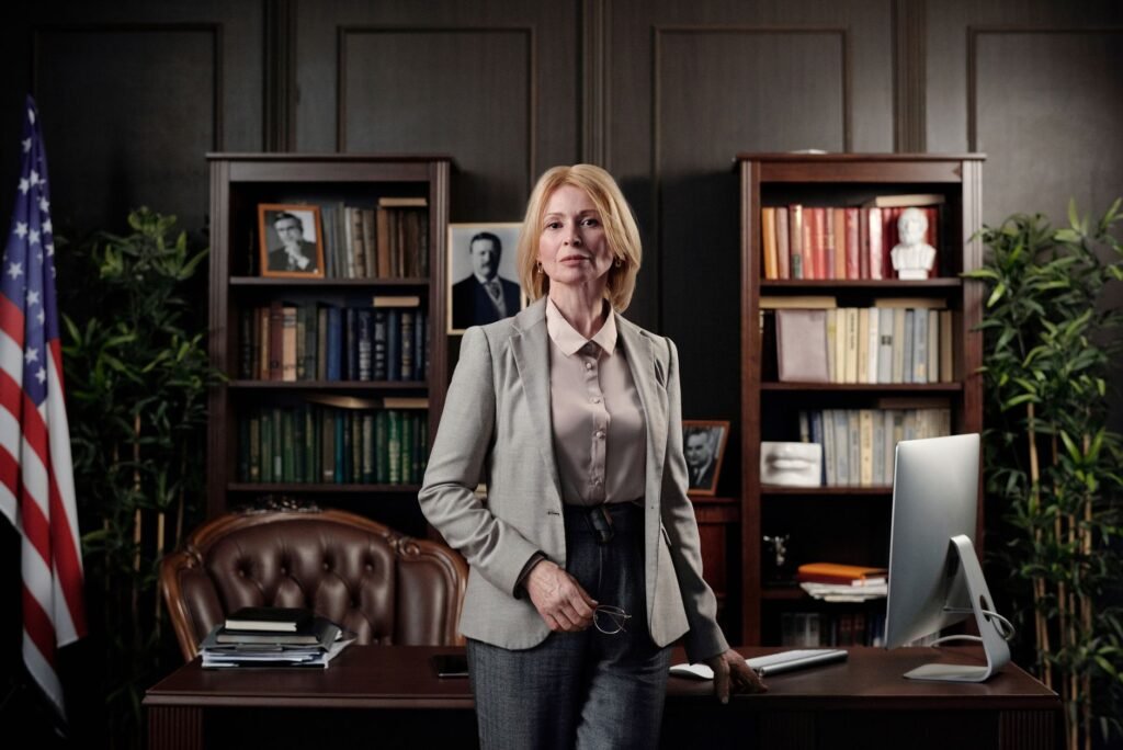 Portrait of a confident businesswoman standing in an elegant office setting.