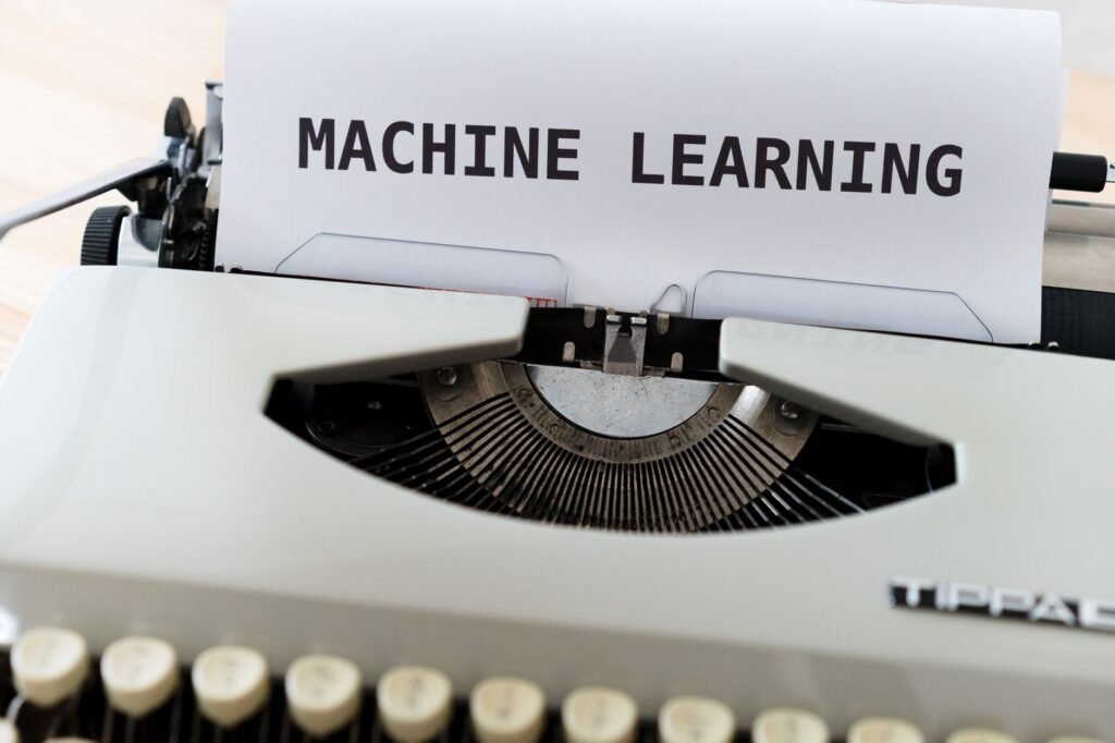 Vintage typewriter displaying 'Machine Learning' text, blending old and new concepts.