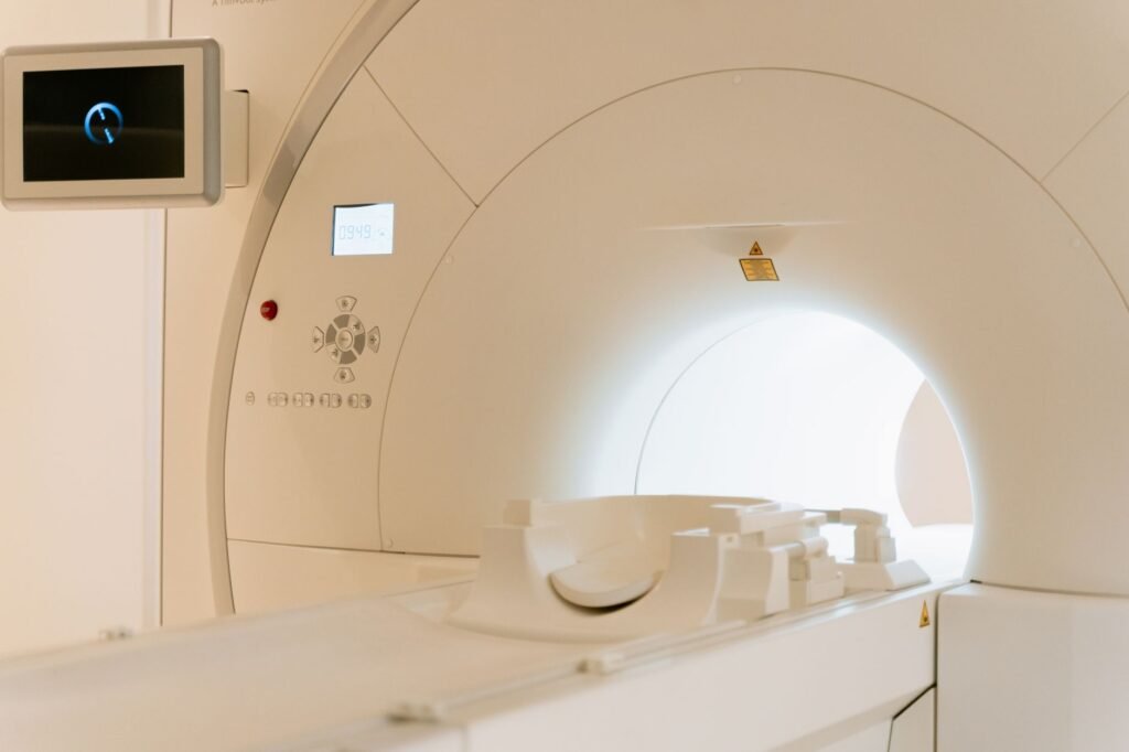 Close-up view of a modern CT scanner in a healthcare facility.