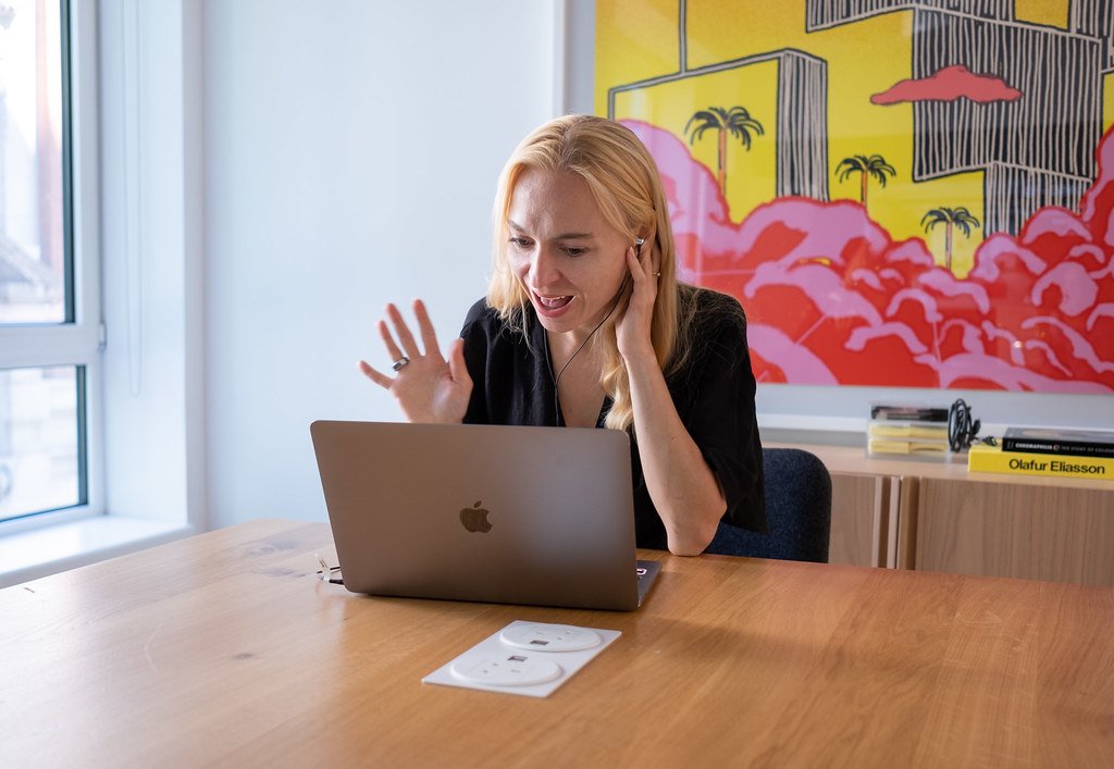 Engaged Female Employee in Virtual Meeting
